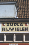 880110 Gezicht op de muurreclame 'ZURLA RIJWIELEN' op de zijgevel van rijwielhandel Huijsen (Draaiweg 37) te Utrecht, ...